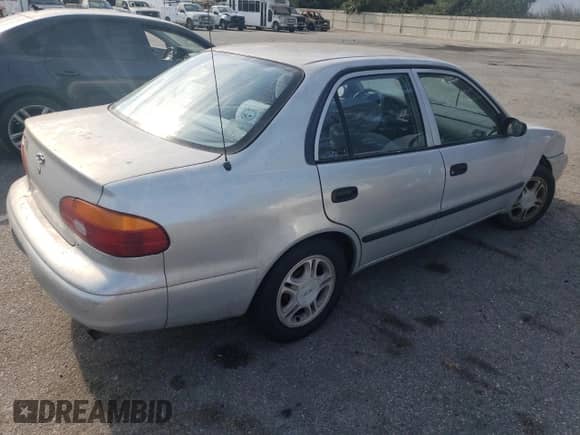 2001 Chevrolet Prizm с VIN 1Y1SK52811Z447352, выставлен на аукционе Copart как лот 73916394 с пробегом 89 265 миль миль и Списание • Salvage title. История ставок и продаж доступна на DreamBid. Изображение 3.