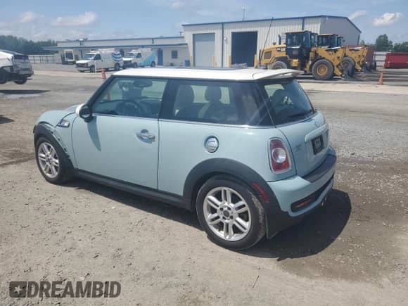 2013 MINI Hardtop S with VIN WMWSV3C50DT392465, listed as a Copart auction lot 58340735 with 40,731 mi miles and Salvage title. Bid and sale history available at DreamBid. Image 2.
