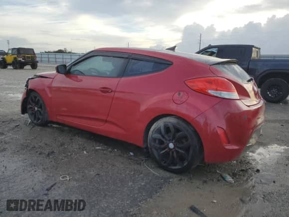 2013 Hyundai Veloster w/Gray Int z VIN KMHTC6AD9DU138767, wystawiony jako Copart lot #85260395 z przebiegiem 176 745 mil mil oraz Szkoda całkowita • Salvage title. Historia ofert i sprzedaży dostępna na DreamBid. Obrazek 2.