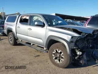 2017 Toyota Tacoma SR5 with VIN 3TMCZ5AN9HM089795, listed as a IAAI auction lot 43390094 with 83,988 mi miles and . Bid and sale history available at DreamBid. Image 1.
