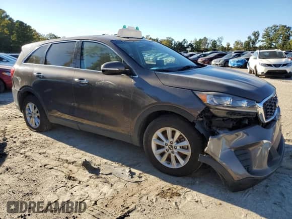 2020 Kia Sorento LX с VIN 5XYPG4A55LG615444, выставлен на аукционе Copart как лот 69177205 с пробегом 198 304 миль миль и Чистый • Clean title. История ставок и продаж доступна на DreamBid. Изображение 4.