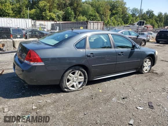 2014 Chevrolet Impala LT с VIN 2G1WB5E39E1125815, выставлен на аукционе Copart как лот 80198385 с пробегом 122 694 миль миль и Списание • Salvage title. История ставок и продаж доступна на DreamBid. Изображение 3.