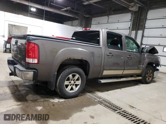 2007 GMC Sierra 1500 SLT with VIN 2GTEC13J371523406, listed as a Copart auction lot 89499175 with 198,160 mi miles and Salvage title. Bid and sale history available at DreamBid. Image 3.