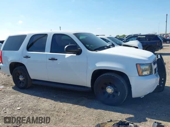 2013 Chevrolet Tahoe Commercial with VIN 1GNLC2E07DR239921, listed as a IAAI auction lot 43121086 with 116,427 mi miles and . Bid and sale history available at DreamBid. Image 13.