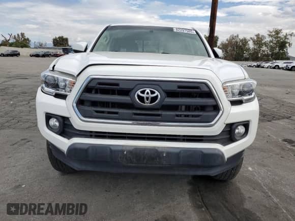 2016 Toyota Tacoma SR5 with VIN 5TFAX5GNXGX053627, listed as a Copart auction lot 82297585 with 80,982 mi miles and Salvage title. Bid and sale history available at DreamBid. Image 5.