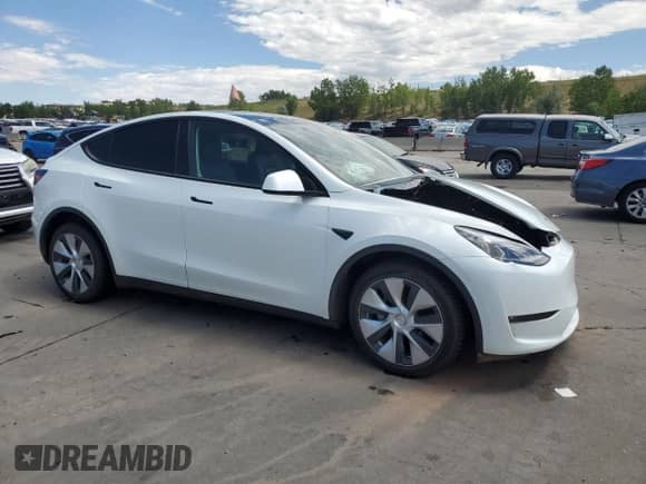 2023 Tesla Model Y Long Range with VIN 7SAYGAEE5PF592387, listed as a Copart auction lot 67555634 with 30,078 mi miles and Salvage title. Bid and sale history available at DreamBid. Image 4.