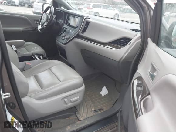 2015 Toyota Sienna Limited with VIN 5TDDK3DC6FS128167, listed as a IAAI auction lot 41699588 with 179,723 mi miles and . Bid and sale history available at DreamBid. Image 5.