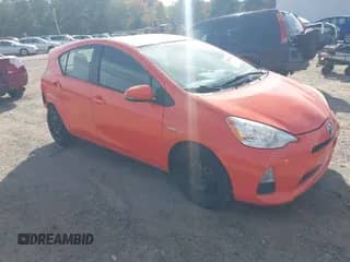 2013 Toyota Prius Three z VIN JTDKDTB3XD1042486, wystawiony jako IAAI lot #43319016 z przebiegiem 125 557 mil mil oraz . Historia ofert i sprzedaży dostępna na DreamBid. Obrazek 1.