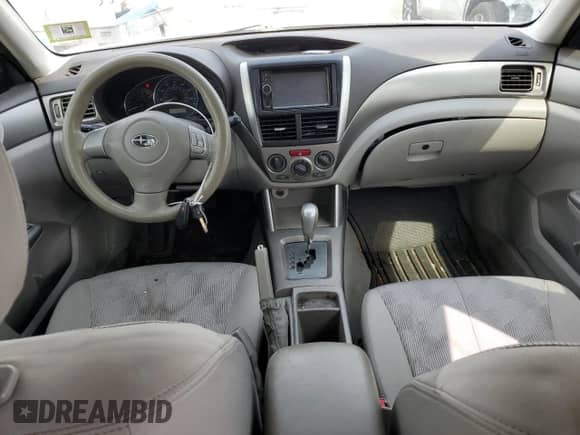 2010 Subaru Forester X with VIN JF2SH6BC6AH770770, listed as a Copart auction lot 67710815 with 217,038 mi miles and Salvage title. Bid and sale history available at DreamBid. Image 8.