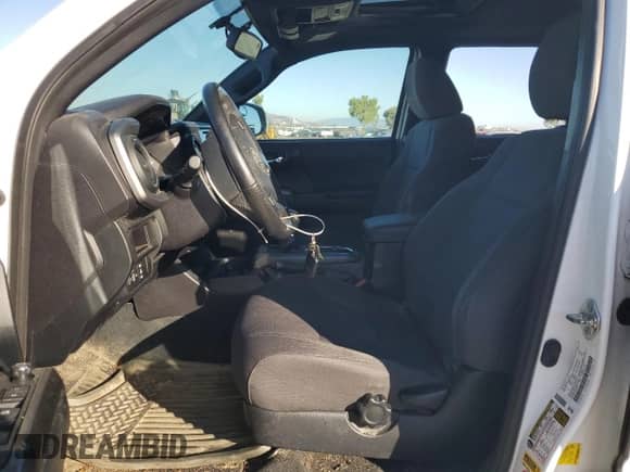2016 Toyota Tacoma TRD Sport with VIN 3TMBZ5DN9GM001172, listed as a Copart auction lot 86475475 with 92,598 mi miles and Salvage title. Bid and sale history available at DreamBid. Image 7.