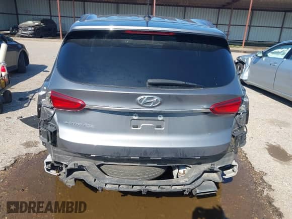2019 Hyundai Santa Fe SE with VIN 5NMS23AD1KH084726, listed as a IAAI auction lot 43171817 with 69,541 mi miles and . Bid and sale history available at DreamBid. Image 16.