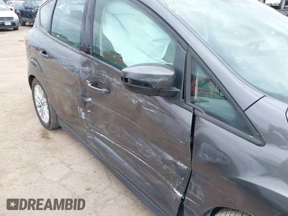 2017 Ford C-Max SE with VIN 1FADP5AU3HL117180, listed as a IAAI auction lot 42875986 with 123,324 mi miles and . Bid and sale history available at DreamBid. Image 6.