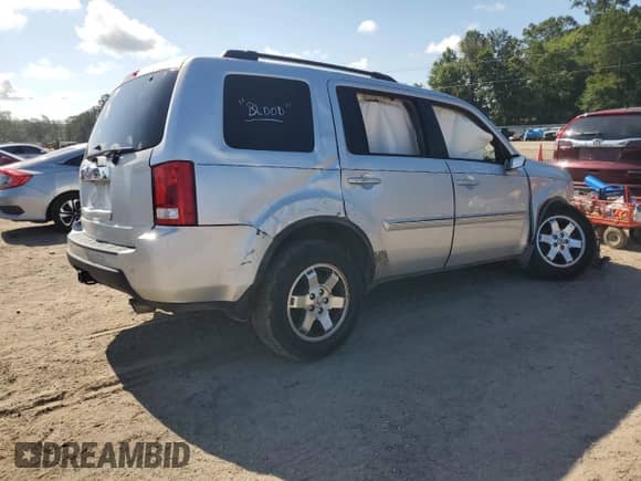 2009 Honda Pilot Touring with VIN 5FNYF38809B002505, listed as a Copart auction lot 61857065 with Not provided miles and Salvage title. Bid and sale history available at DreamBid. Image 3.