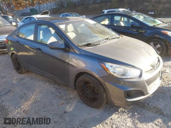 2012 Hyundai Accent GLS z VIN KMHCT4AE8CU081487, wystawiony jako IAAI lot #43563113 z przebiegiem 144 761 mil mil oraz . Historia ofert i sprzedaży dostępna na DreamBid. Obrazek 1.