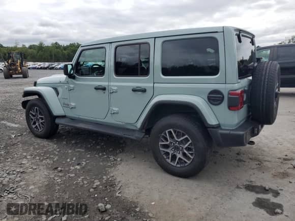 2024 Jeep Wrangler Sahara z VIN 1C4PJXEG9RW334127, wystawiony jako Copart lot #69811845 z przebiegiem 7 372 mil mil oraz Szkoda całkowita • Salvage title. Historia ofert i sprzedaży dostępna na DreamBid. Obrazek 2.