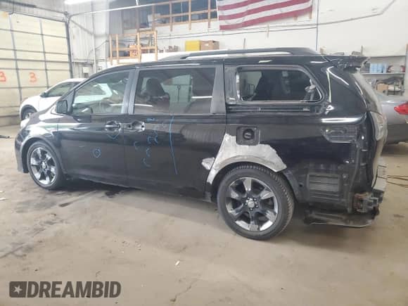 2011 Toyota Sienna SE with VIN 5TDXK3DCXBS110665, listed as a Copart auction lot 84588025 with 317,691 mi miles and Salvage title. Bid and sale history available at DreamBid. Image 2.