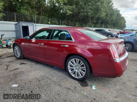 2013 Chrysler 300 C with VIN 2C3CCAET9DH698904, listed as a Copart auction lot 81753255 with 148,416 mi miles and Salvage title. Bid and sale history available at DreamBid. Image 2.