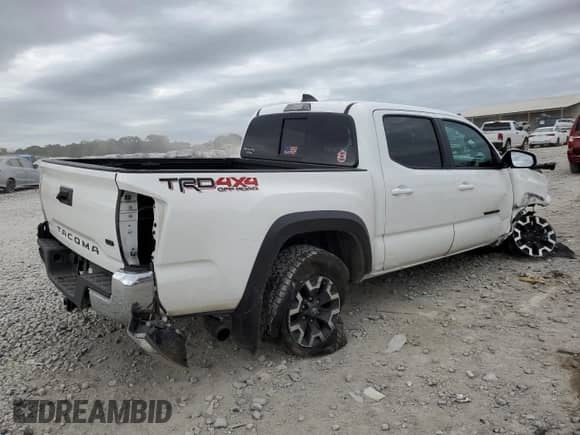 2022 Toyota Tacoma TRD Off Road with VIN 3TYCZ5AN4NT099666, listed as a Copart auction lot 85094295 with 45,880 mi miles and Salvage title. Bid and sale history available at DreamBid. Image 3.