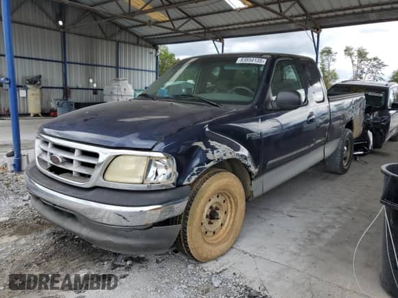2003 Ford F-150 XL with VIN 2FTRX17203CA61104, listed as a Copart auction lot 83854135 with Not provided miles and Salvage title. Bid and sale history available at DreamBid. Image 1.