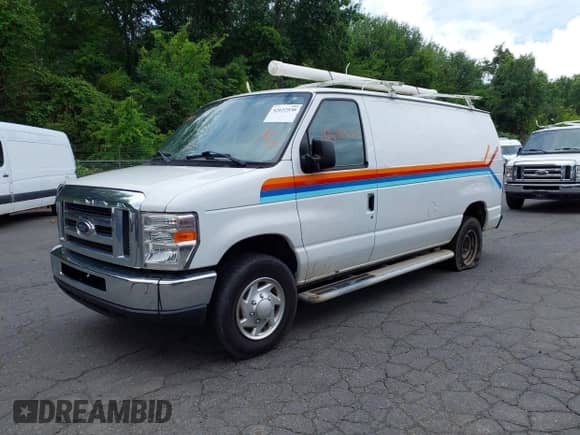 2013 Ford Econoline Cargo Commercial with VIN 1FTNE2EW5DDA16130, listed as a IAAI auction lot 42622530 with 183,090 mi miles and . Bid and sale history available at DreamBid. Image 2.