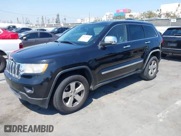 2012 Jeep Grand Cherokee Limited z VIN 1C4RJEBG0CC195421, wystawiony jako IAAI lot #42975299 z przebiegiem 152 546 mil mil oraz . Historia ofert i sprzedaży dostępna na DreamBid. Obrazek 17.