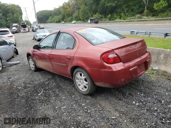 2005 Dodge Neon SXT with VIN 1B3ES56C45D218961, listed as a Copart auction lot 71672325 with 94,501 mi miles and Salvage title. Bid and sale history available at DreamBid. Image 2.