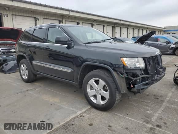 2012 Jeep Grand Cherokee Laredo с VIN 1C4RJEATXCC317054, выставлен на аукционе Copart как лот 63057615 с пробегом 159 633 миль миль и Списание • Salvage title. История ставок и продаж доступна на DreamBid. Изображение 4.
