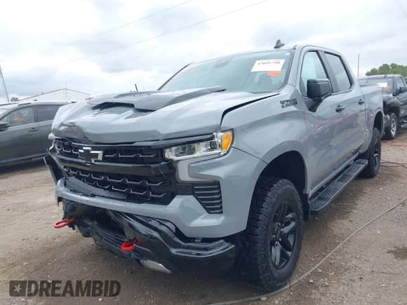 2024 Chevrolet Silverado 1500 LT Trail Boss z VIN 3GCUDFED0RG262534, wystawiony jako IAAI lot #43041798 z przebiegiem 13 436 mil mil oraz . Historia ofert i sprzedaży dostępna na DreamBid. Obrazek 2.