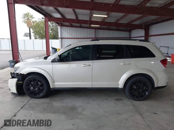 2013 Dodge Journey SXT with VIN 3C4PDCBB3DT661615, listed as a IAAI auction lot 43455375 with 99,763 mi miles and . Bid and sale history available at DreamBid. Image 14.