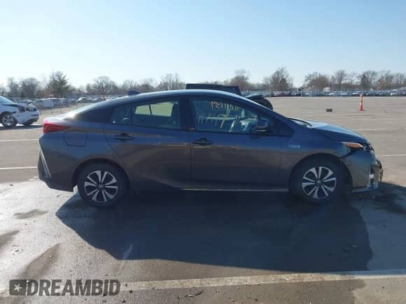 2018 Toyota Prius Plus z VIN JTDKARFP9J3072801, wystawiony jako IAAI lot #41741739 z przebiegiem 80 953 mil mil oraz . Historia ofert i sprzedaży dostępna na DreamBid. Obrazek 14.
