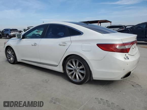 2013 Hyundai Azera with VIN KMHFH4JGXDA245793, listed as a Copart auction lot 82435324 with 144,269 mi miles and Clean title. Bid and sale history available at DreamBid. Image 2.