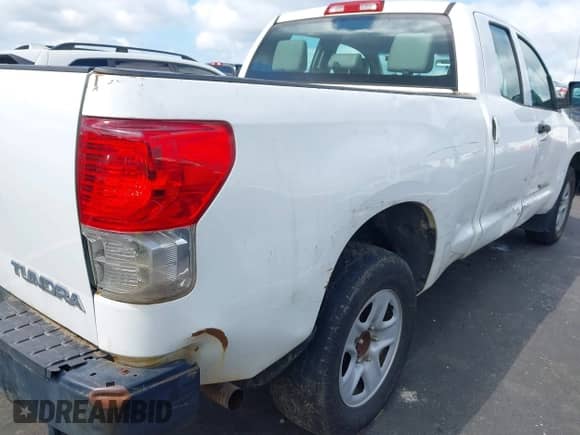 2012 Toyota Tundra z VIN 5TFRU5F10CX026554, wystawiony jako IAAI lot #43010233 z przebiegiem 221 656 mil mil oraz . Historia ofert i sprzedaży dostępna na DreamBid. Obrazek 18.