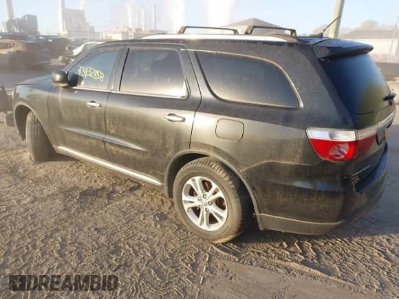 2013 Dodge Durango Crew with VIN 1C4RDJDG4DC659891, listed as a IAAI auction lot 43432858 with 211,933 mi miles and . Bid and sale history available at DreamBid. Image 3.