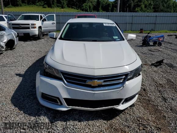 2018 Chevrolet Impala LT with VIN 2G1105S39J9148320, listed as a Copart auction lot 61401035 with 136,121 mi miles and Salvage title. Bid and sale history available at DreamBid. Image 5.