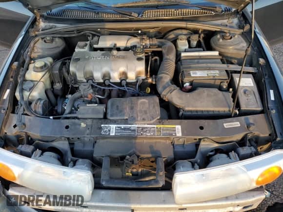 2002 Saturn SL with VIN 1G8ZG52842Z136529, listed as a Copart auction lot 69322825 with 215,279 mi miles and Salvage title. Bid and sale history available at DreamBid. Image 11.