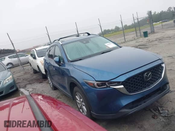 2023 Mazda CX-5 S Carbon Edition z VIN JM3KFBCM0P0195827, wystawiony jako IAAI lot #42905023 z przebiegiem 31 766 mil mil oraz . Historia ofert i sprzedaży dostępna na DreamBid. Obrazek 1.