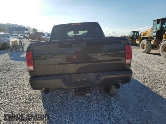 2015 Ram 1500 Express with VIN 3C6RR6KT4FG687180, listed as a Copart auction lot 89739715 with 106,169 mi miles and Salvage title. Bid and sale history available at DreamBid. Image 6.