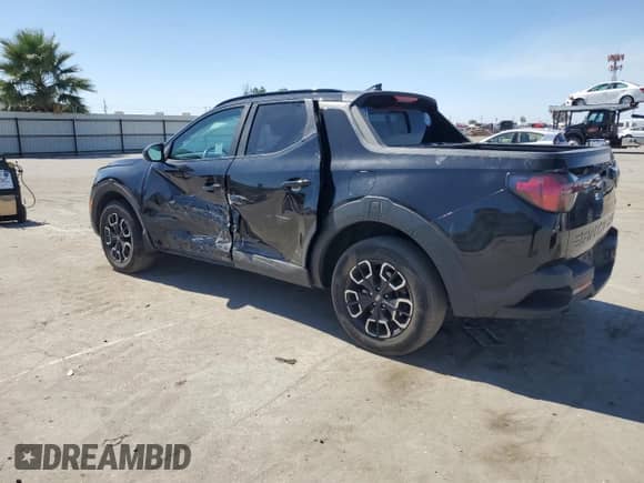 2022 Hyundai Santa Cruz SEL Premium z VIN 5NTJDDAF9NH005177, wystawiony jako Copart lot #61078975 z przebiegiem 26 924 mil mil oraz Szkoda całkowita • Salvage title. Historia ofert i sprzedaży dostępna na DreamBid. Obrazek 2.