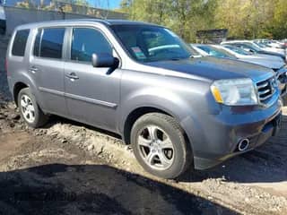 2015 Honda Pilot EX z VIN 5FNYF4H43FB005476, wystawiony jako IAAI lot #43441566 z przebiegiem 121 571 mil mil oraz . Historia ofert i sprzedaży dostępna na DreamBid. Obrazek 1.