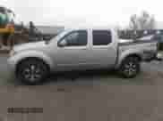 2011 Nissan Frontier Pro-4X with VIN 1N6AD0EV2BC438370, listed as a IAAI auction lot 41952484 with 217,529 mi miles and . Bid and sale history available at DreamBid. Image 14.