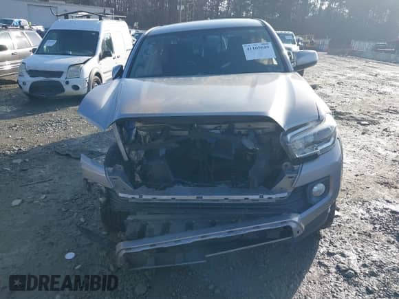 2017 Toyota Tacoma SR5 with VIN 5TFAZ5CNXHX024596, listed as a IAAI auction lot 41105049 with 186,796 mi miles and . Bid and sale history available at DreamBid. Image 12.