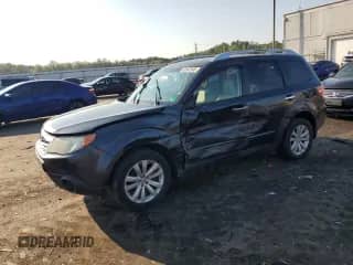 2012 Subaru Forester X Touring z VIN JF2SHAGC0CH456739, wystawiony jako Copart lot #65942945 z przebiegiem 135 829 mil mil oraz Szkoda całkowita • Salvage title. Historia ofert i sprzedaży dostępna na DreamBid. Obrazek 1.