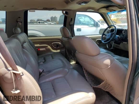 1998 Chevrolet Tahoe z VIN 1GNEC13R4WR131926, wystawiony jako Copart lot #61548494 z przebiegiem 354 592 mil mil oraz Szkoda całkowita • Salvage title. Historia ofert i sprzedaży dostępna na DreamBid. Obrazek 11.