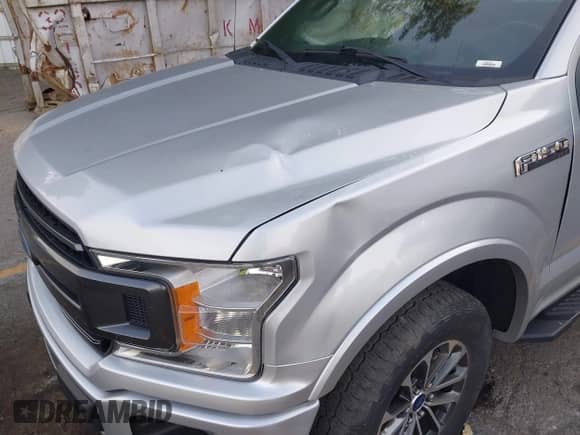 2019 Ford F-150 XLT z VIN 1FTEW1EP6KKD95650, wystawiony jako IAAI lot #42834163 z przebiegiem 100 460 mil mil oraz . Historia ofert i sprzedaży dostępna na DreamBid. Obrazek 6.