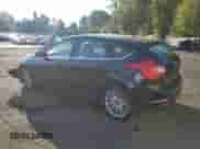 2014 Ford Focus Titanium with VIN 1FADP3N22EL161938, listed as a Copart auction lot 83815915 with 108,682 mi miles and Salvage title. Bid and sale history available at DreamBid. Image 2.