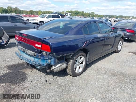 2014 Dodge Charger SXT with VIN 2C3CDXHGXEH318582, listed as a IAAI auction lot 43352491 with 165,644 mi miles and . Bid and sale history available at DreamBid. Image 4.
