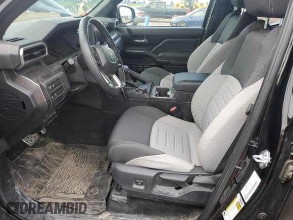2024 Toyota Tacoma SR5 with VIN 3TYLB5JN2RT055045, listed as a Copart auction lot 69134065 with 25,584 mi miles and Salvage title. Bid and sale history available at DreamBid. Image 7.