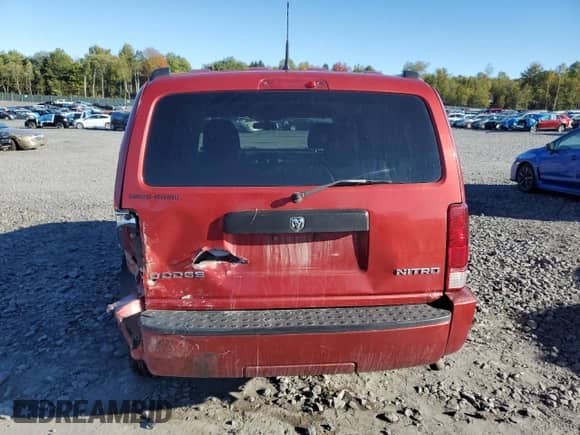 2011 Dodge Nitro Heat with VIN 1D4PU4GK6BW529117, listed as a Copart auction lot 82305125 with 180,005 mi miles and Salvage title. Bid and sale history available at DreamBid. Image 6.