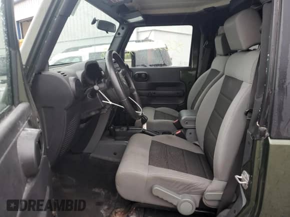 2009 Jeep Wrangler X с VIN 1J4FA24169L708281, выставлен на аукционе Copart как лот 85533845 с пробегом 83 553 миль миль и Списание • Salvage title. История ставок и продаж доступна на DreamBid. Изображение 7.