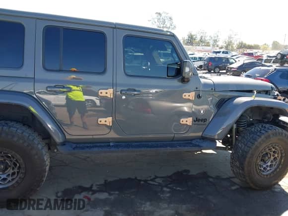 2022 Jeep Wrangler Unlimited Sahara with VIN 1C4HJXEN7NW118631, listed as a IAAI auction lot 43162128 with 31,235 mi miles and . Bid and sale history available at DreamBid. Image 13.